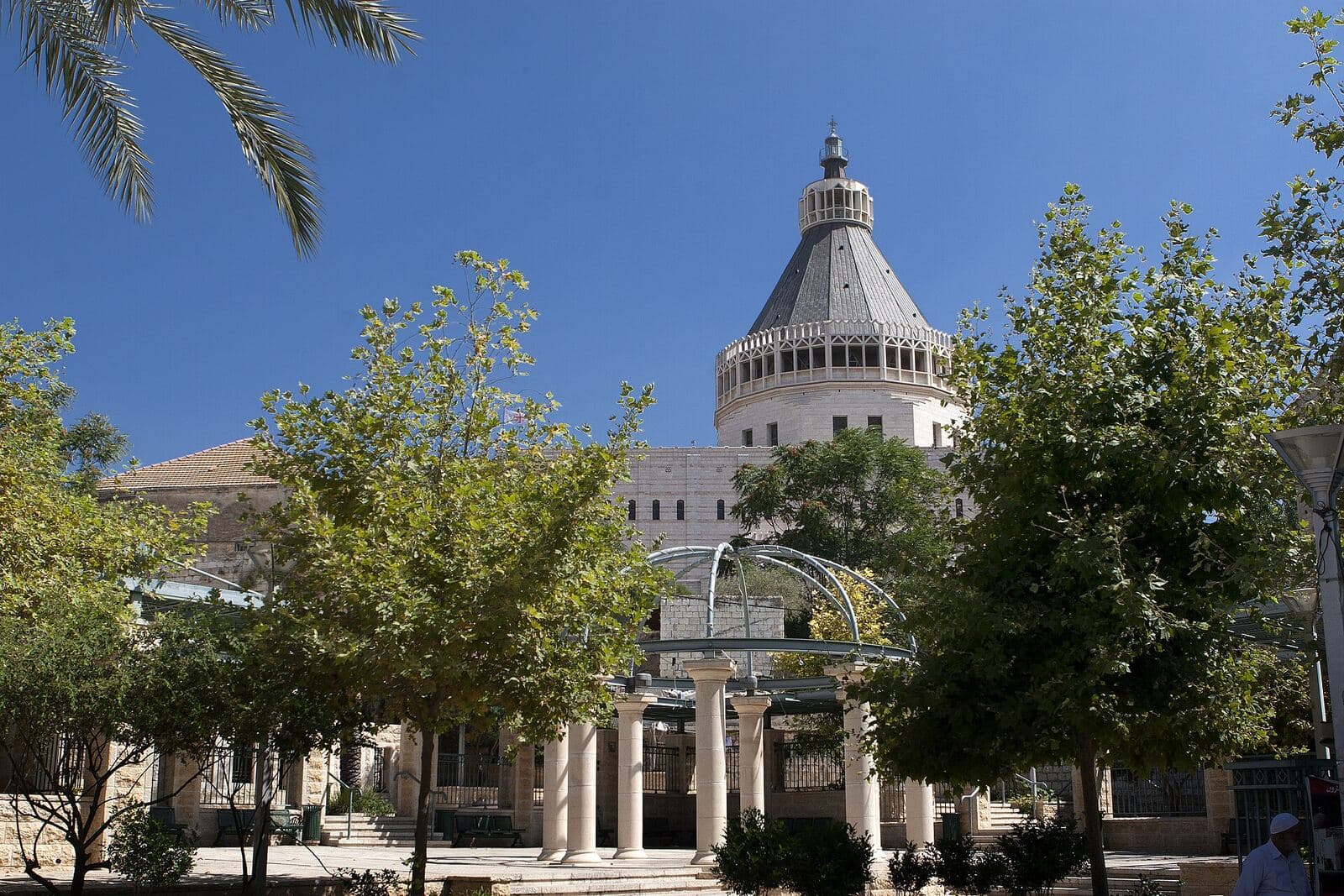The lantern dome of the Basilica of the Annunciation in Nazareth, framed by trees
